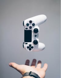 A controller hovering above a hand