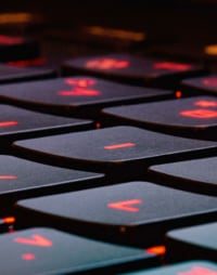 A black keyboard with red lights
